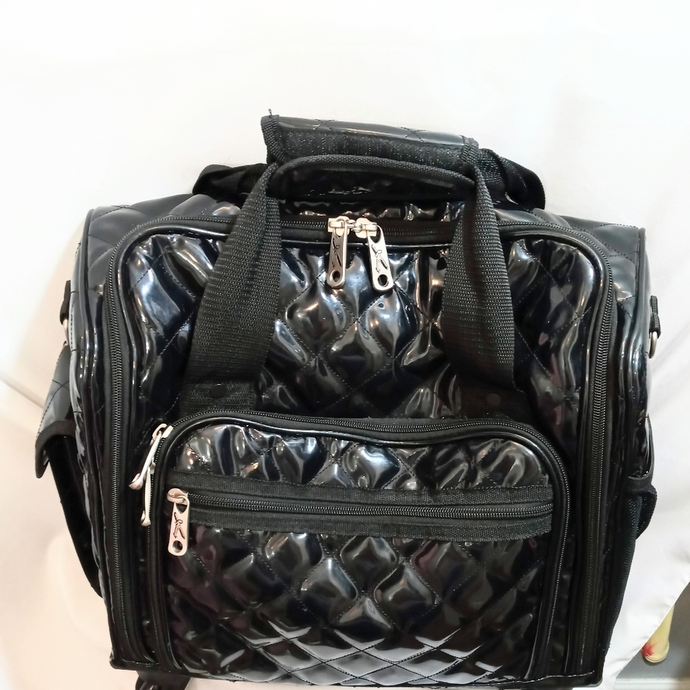 TravelSmith Spinner 360 Weekender Luggage